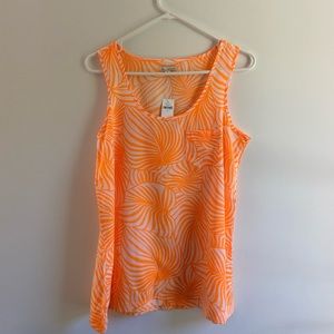 Soft orange and white sleeveless blouse